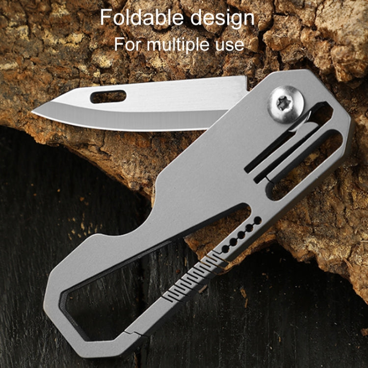 Folded mini titanium keychain knife with vent slots and extended blade edge