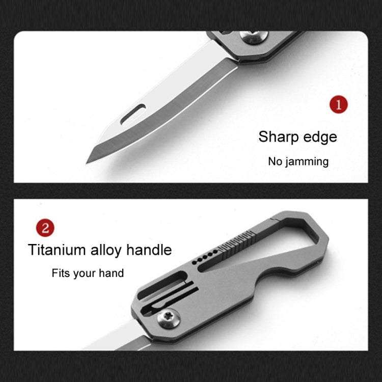 Mini folding knife showing sharp edge and titanium-alloy handle shape