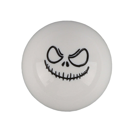 White spherical shift knob with black ghost face and stitched grin