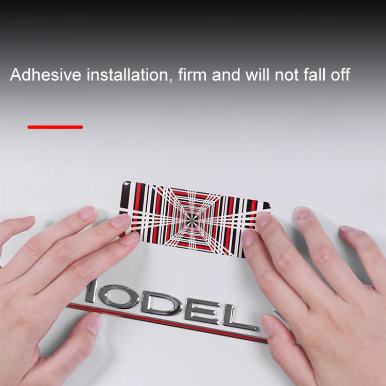 Rectangular metal car tail decoration label being applied by hands, black time tunnel print