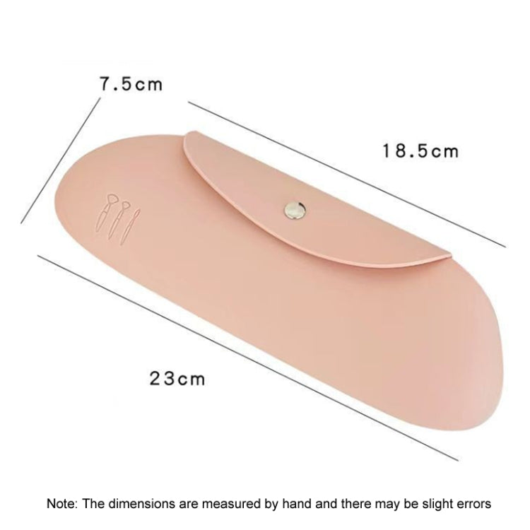 Pink silicone makeup brush storage bag with measurements, curved cap-style design