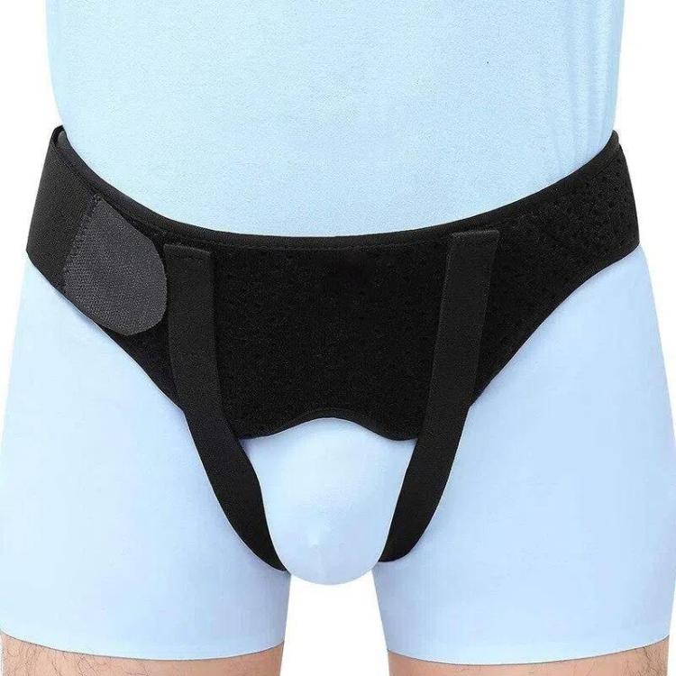 Adult hernia belt with dark front panel and rounded groin pad for hernia support