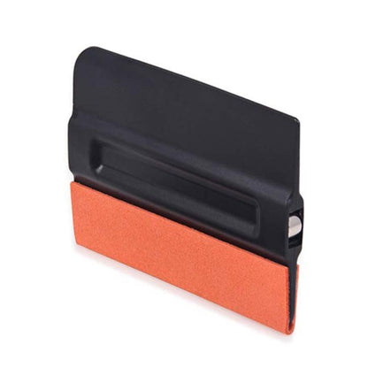 Magnetic car film scraper with orange abrasive pad and black ABS handle