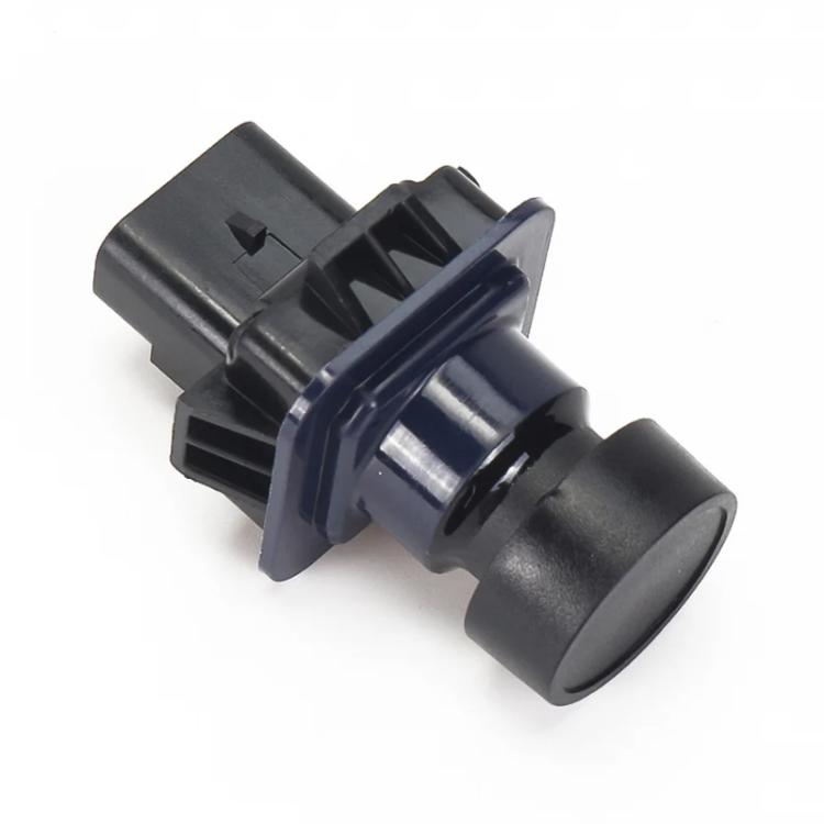 Rear view backup camera module, close-up of lens and dark mounting clip