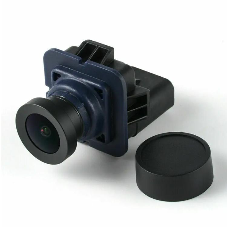 Rear view backup camera module with lens and protective cover cap