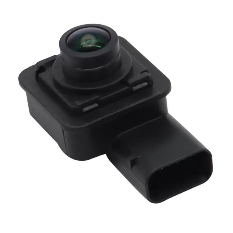 Reversing assist camera module with forward lens and connector plug