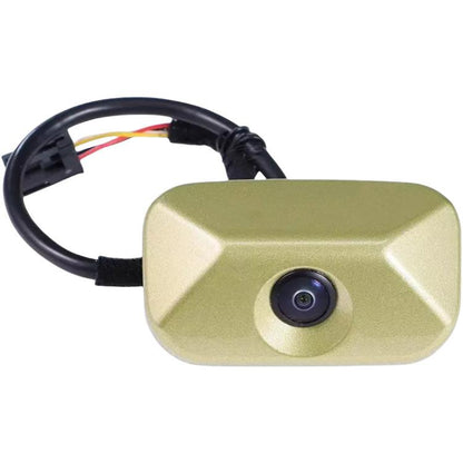 Reversing assist camera with gold housing and built-in lens, wired cable attached