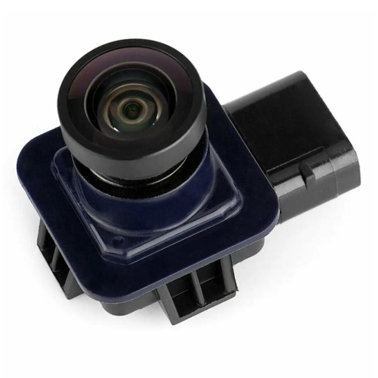 Rear view backup camera with blue housing and black lens, wiring connector attached