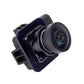 Backup camera lens with dark housing, blue trim, and multi-pin plug