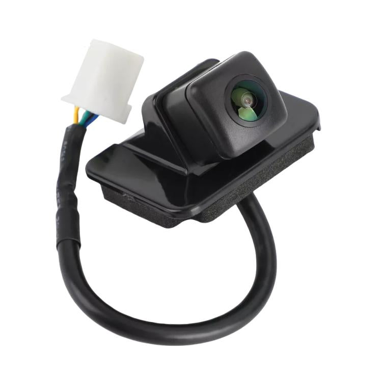 Black rear view reversing assist camera with lens, wiring harness, and white connector