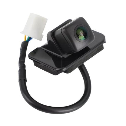Black rear view reversing assist camera with lens, wiring harness, and white connector