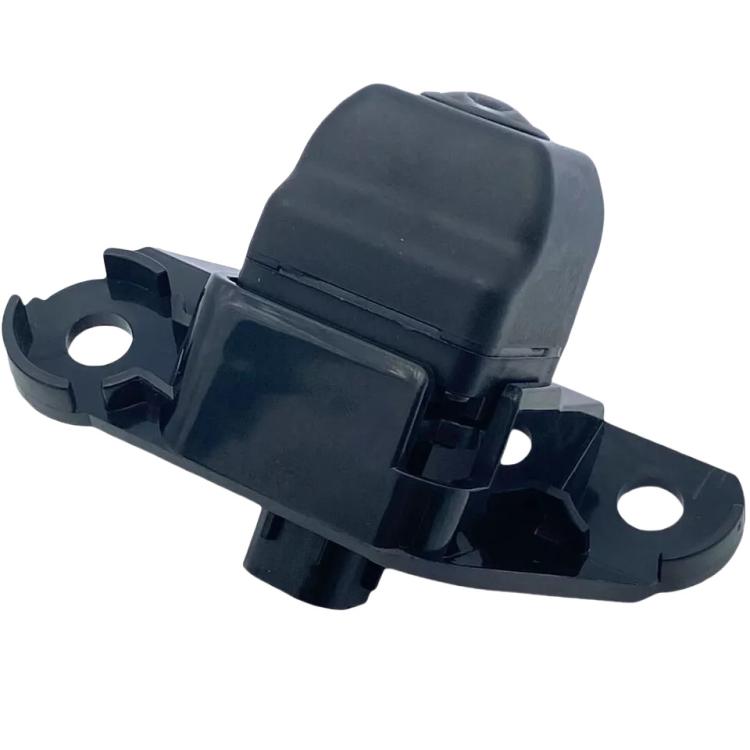 Rearview reverse assist camera module mounting bracket with attachment holes