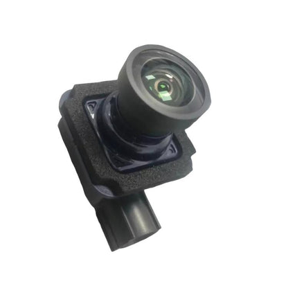 Parking assist camera module with circular lens and black mounting bracket