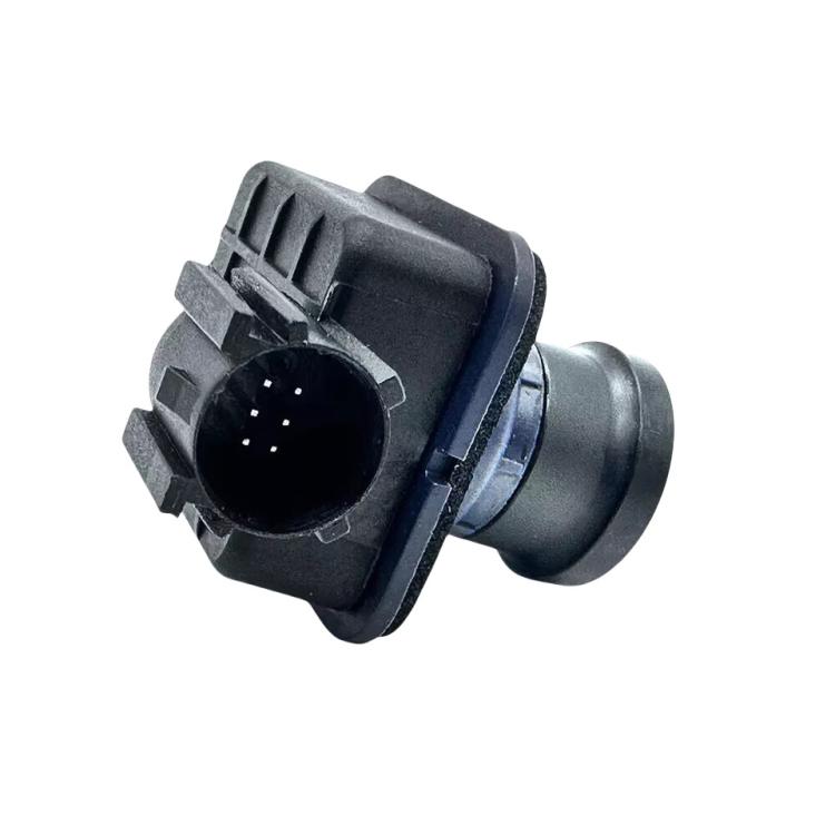 Parking assist camera with side connector and cylindrical cable outlet