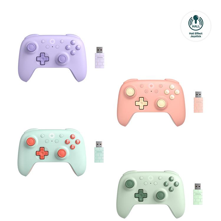 Wireless gaming controller in multiple pastel colors, front view with button layout