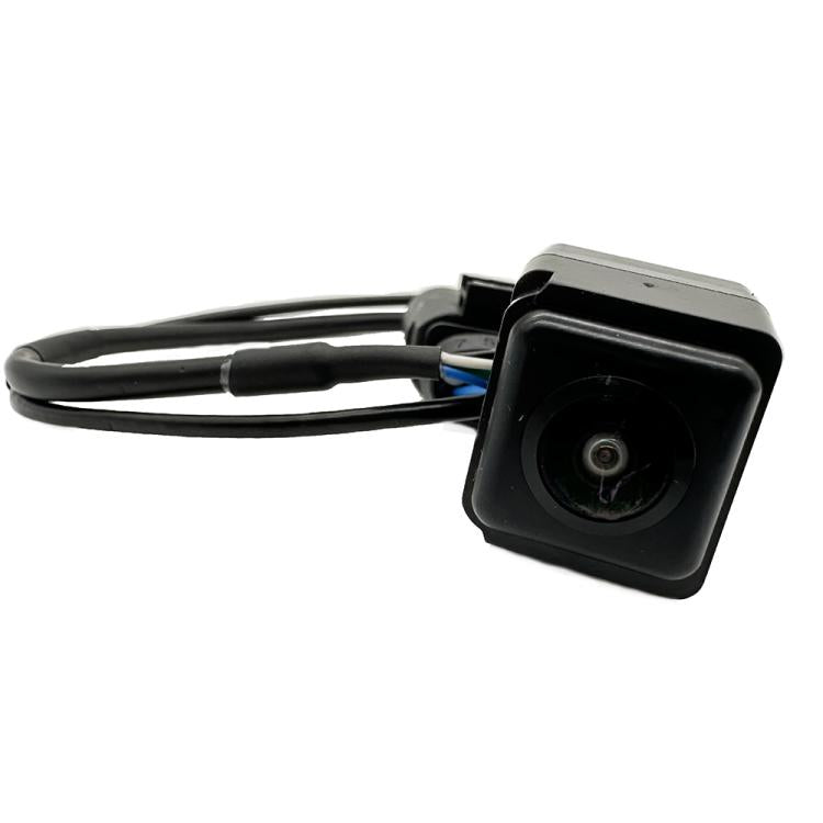 Rear view camera with wiring leads and square black housing, visible circular lens