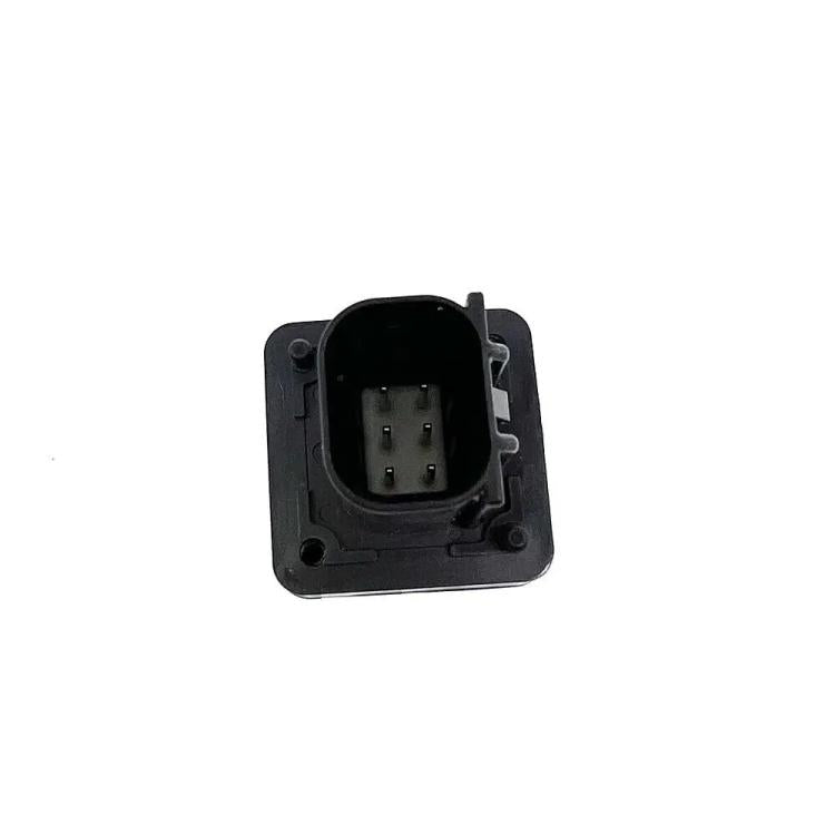 Reversing rear view camera wiring socket on a square black housing