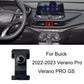 Car dashboard phone mount base with black clamp and ball head near center console vents