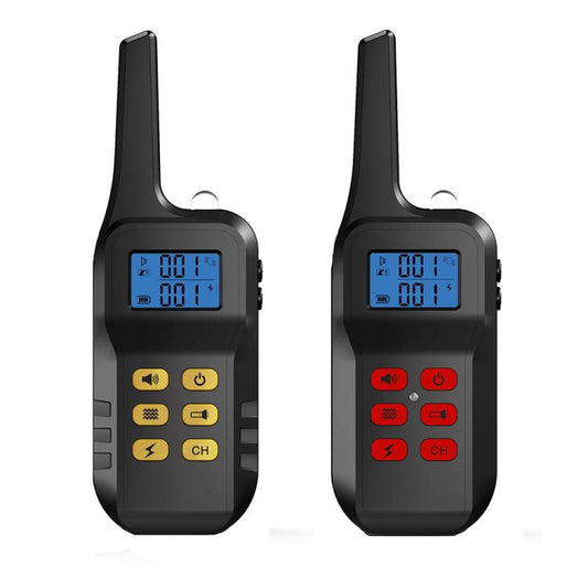 Pair of black dog training remotes, one with yellow buttons and one with red.