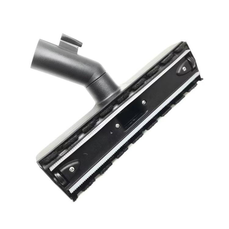 Floor cleaning brush attachment underside with bristle strip and screws