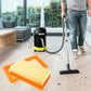 Orange vacuum cartridge filter with pleated paper media on floor beside canister vacuum