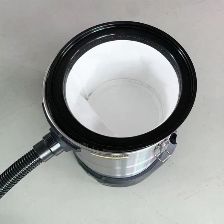 Vacuum dust filter on canister, black rim and white pleated media