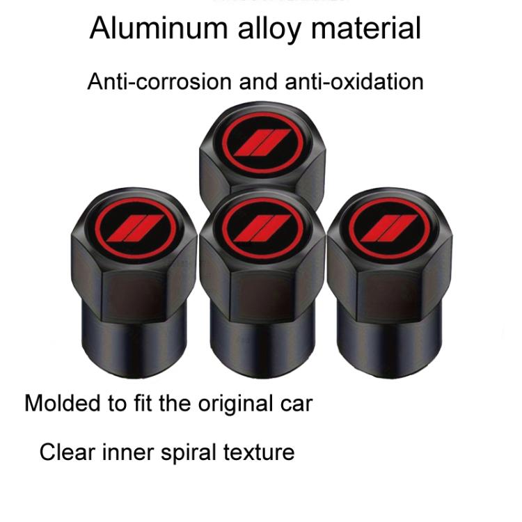 Set of black tire valve caps with red oval logo on round top