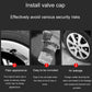 Car tire valve with black valve cap installed