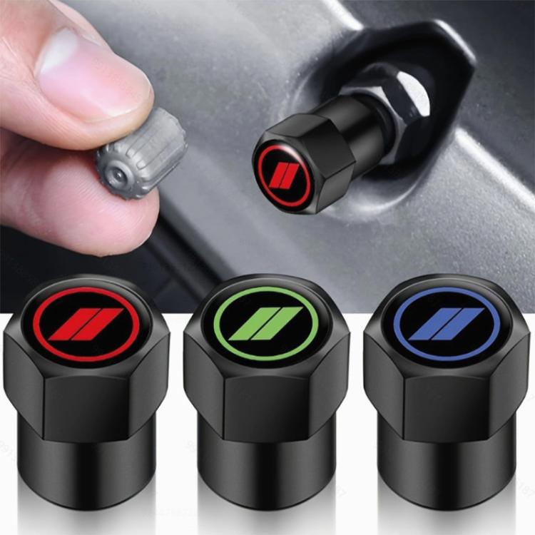 Three black tire valve caps with red, green, and blue logo tops