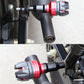 Red anti-drop frame slider with black body and silver mounting bolt, mounted on motorcycle
