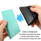Car film scraper tool with black blade and teal backing pad, hand holding