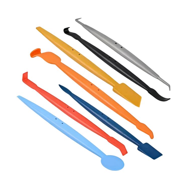 Set of car film edge tools with orange, yellow, blue, black, and silver scrapers