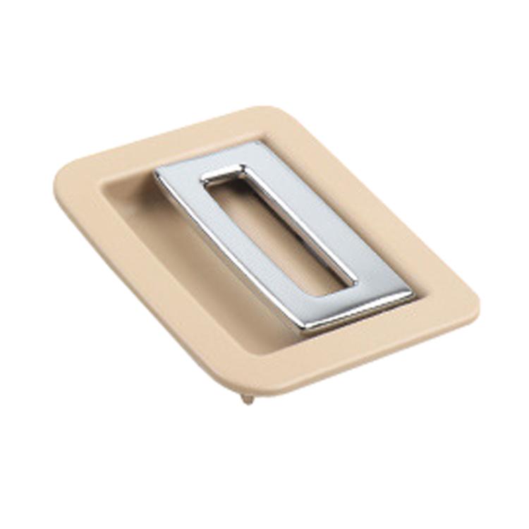 Beige trunk puller/buckle insert with chrome metal center opening
