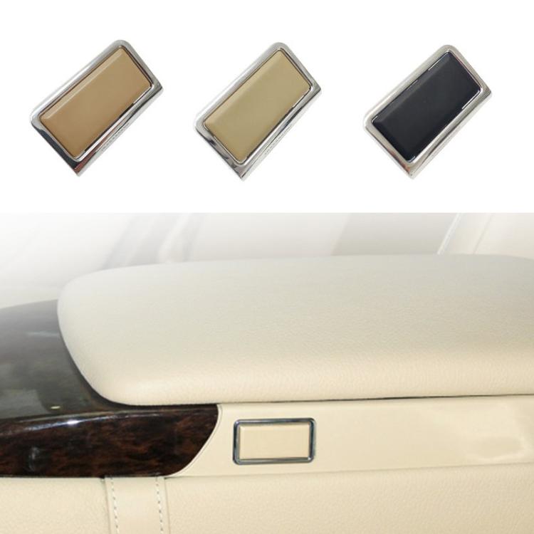 Car center armrest switch bezel set in tan and dark, rectangular pieces