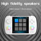White handheld game console front view with on-screen menu and dual speaker grilles