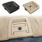 Beige trunk lid handle cover with lock hole, installed on car interior panel