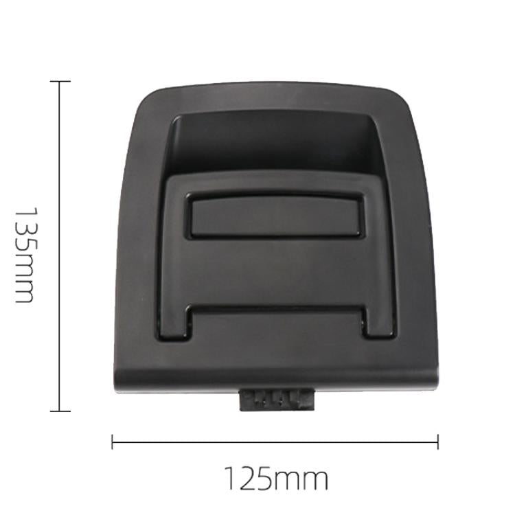 Black trunk lid handle cover with rectangular release opening and mounting tabs