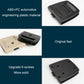 Trunk lid handle cover in black and beige with mounting base and screw holes