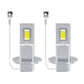 Pair of silver LED headlight bulbs with yellow COB chips, gray socket, and wire leads