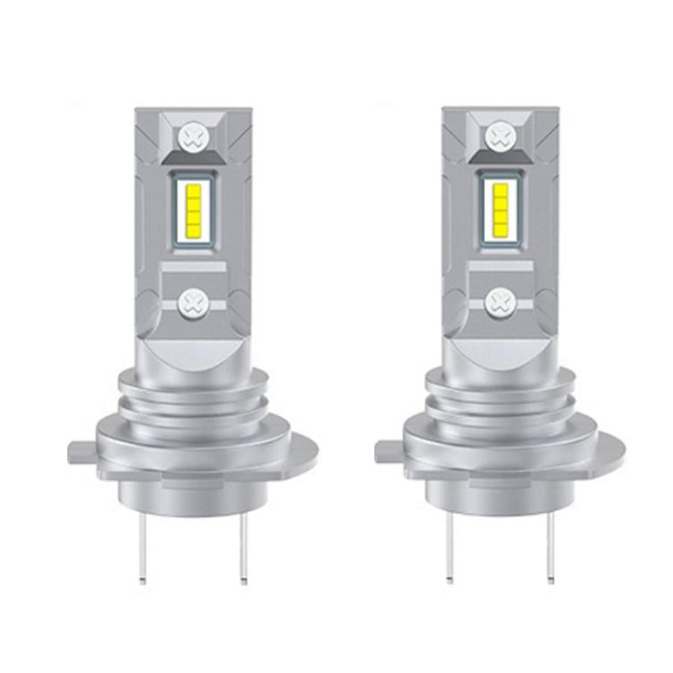 Pair of silver LED headlight bulbs with yellow light modules and metal mounting flanges