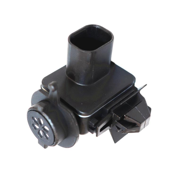 Air quality sensor with cylindrical inlet tube and vented circular face, black housing