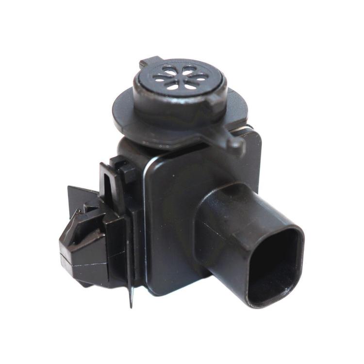 Air quality sensor with circular vent cap and connector clips, angled dark plastic body