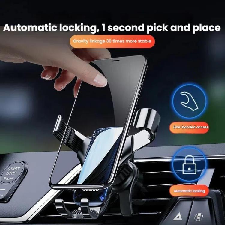 Silver clip-on car phone holder with automatic locking arms holding a phone