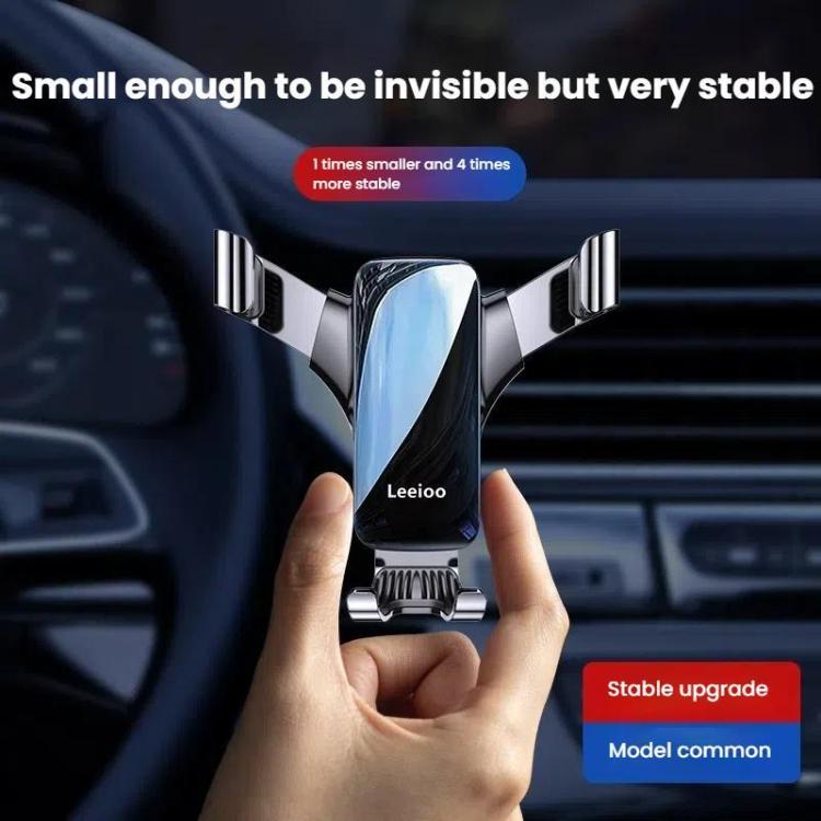 Silver and black compact clip-on car phone holder with vent clamps and cradle