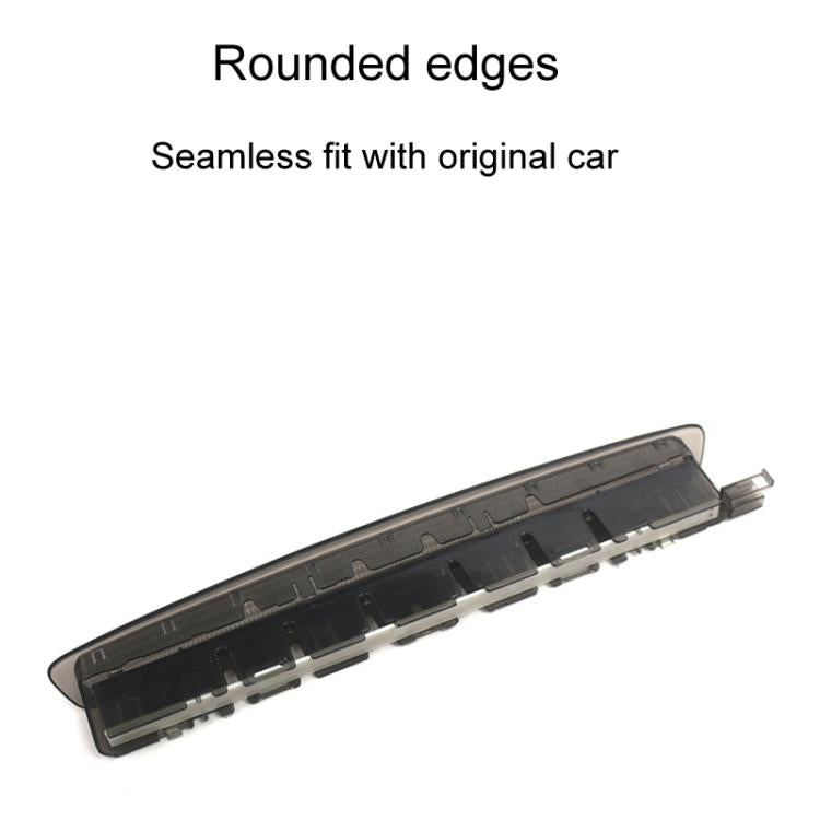 Black third brake light lamp underside cover with metal clips and connector