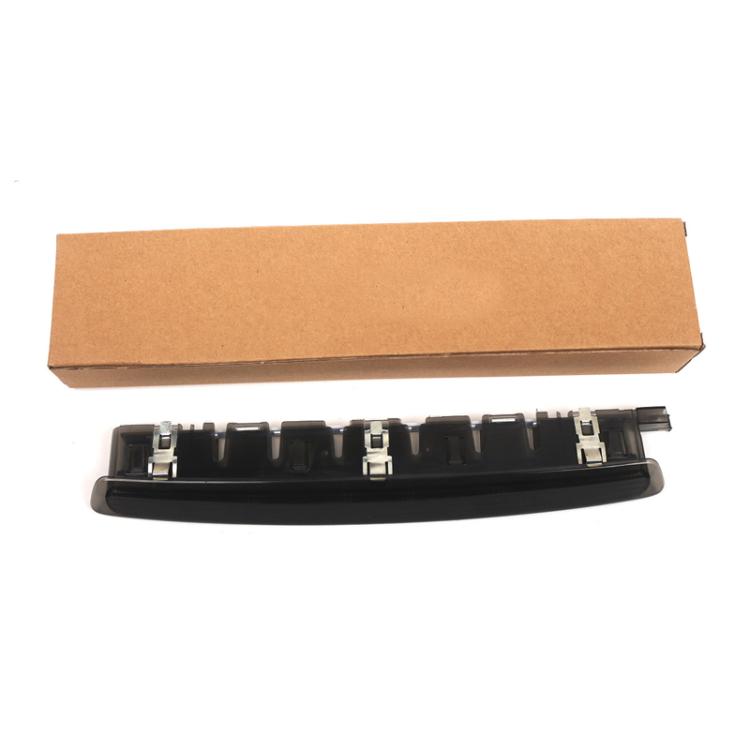 Black third brake light lamp housing underside with mounting clips and connector