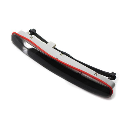 High mounted third brake light with red lens and black housing, rear mounting clips