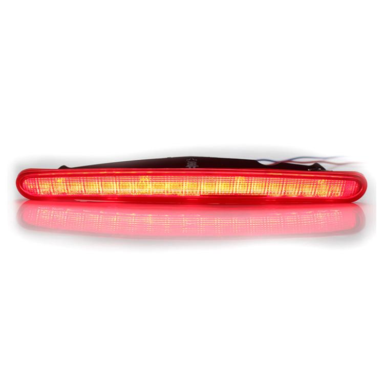 Illuminated high mounted third brake light with red LED glow and lens cover