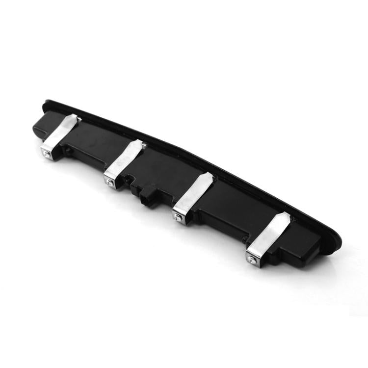 High-mount brake light underside, black cover with metal mounting brackets