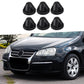 Six black rubber hood grommets set displayed above a car front view.
